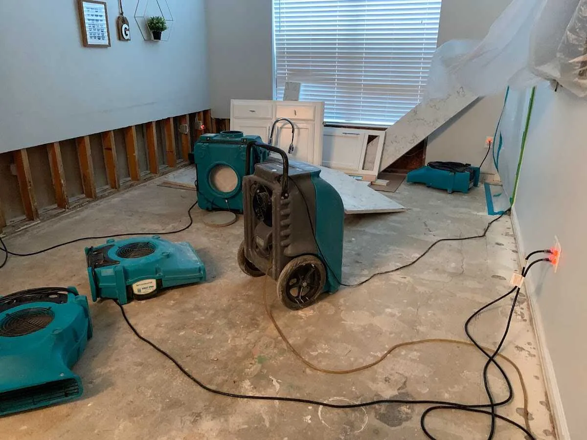 Dehumidifier in flood-cut room for Water Damage Restoration in Tittabawassee